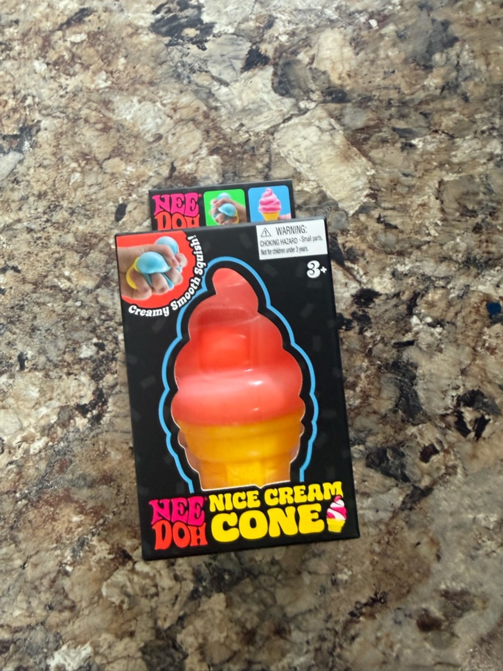 NeeDoh Nice Cream Cone Squishy - orange & Yellow
